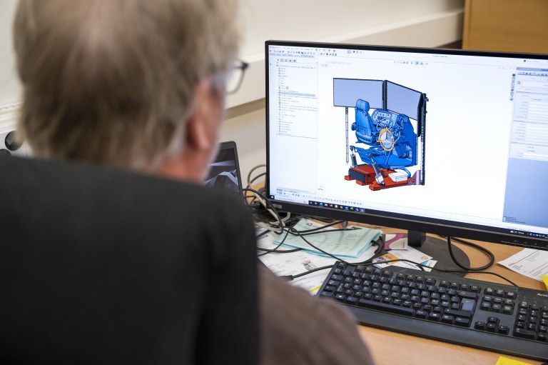 Harri Niemi designing the frame for a Sandvik TH663i simulator.