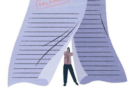 Työntekijä astuu esiin sopimuksen takaa.
