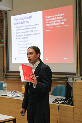 Taneli Riihonen at his lectio praecursoria on the 4th of July 2014 at Aalto University School of Electrical Engineering. Photo: Mariia Riihonen